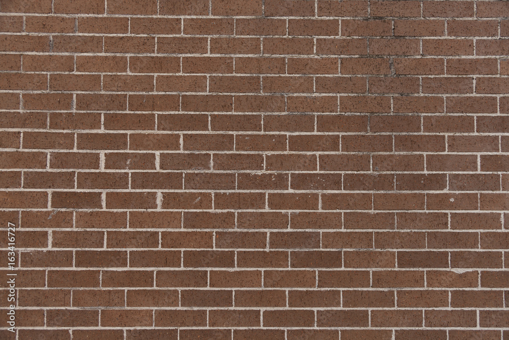 Fototapeta premium czerwony mur z cegły teksturowanej