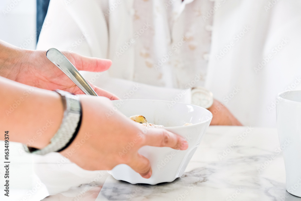 carer bringing meal to senior,meal time. part of senior woman with breakfast, Senior healthy eating carer bringing meal to senior,meal time. part of senior woman with breakfast, Senior healthy eating