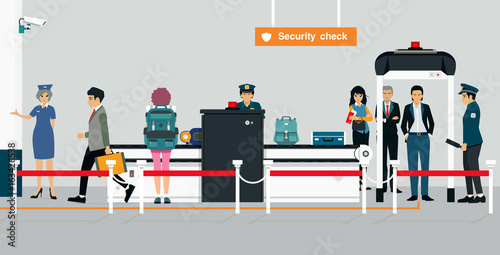 Security checkpoint officers are checking male and female passengers.