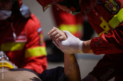 Paramedics rescue the victim of a drill car crash