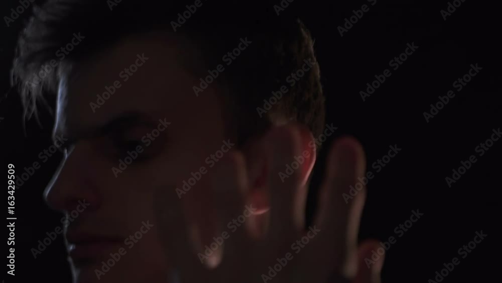 Young guy moves his hands close up Young guy moves his hands close up
