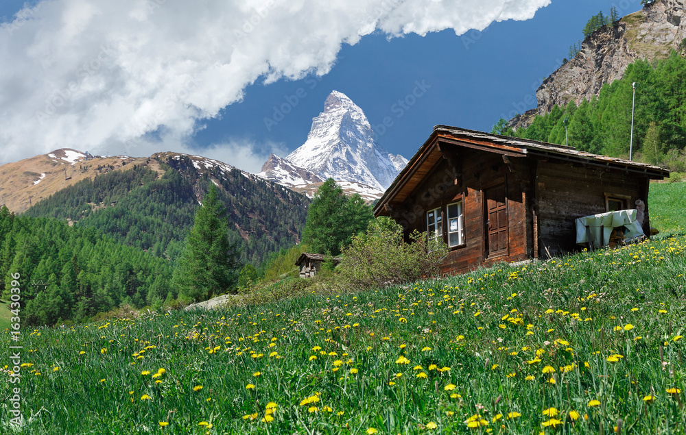 Fototapeta premium Matterhorn mountain in the background of clouds