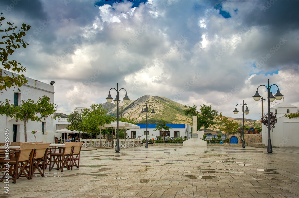 Rainy day and heavy sky over the town square of Skyros island. Sporades islands . Greece