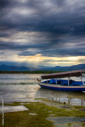 Indian ocean, low tide, fishing boats. Indonesia Gili Air. Early morning, low tide.   © kordeo