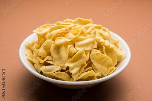 Indian Spicy Namkeen Food Ghatiya and papdi also know as Ganthiya or Gathiya are deep fried snack made from chickpea flour. They are a popular teatime snack in Gujarat
 photo