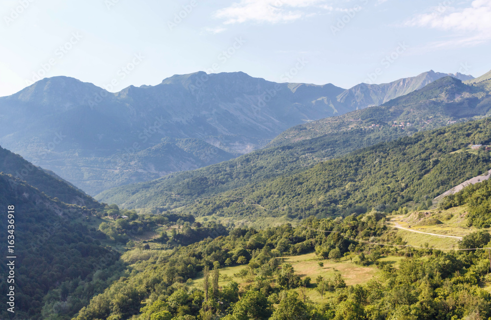 Beautiful green forest mountains at sunset in Greece, Corfu Beautiful green forest mountains at sunset in Greece, Corfu