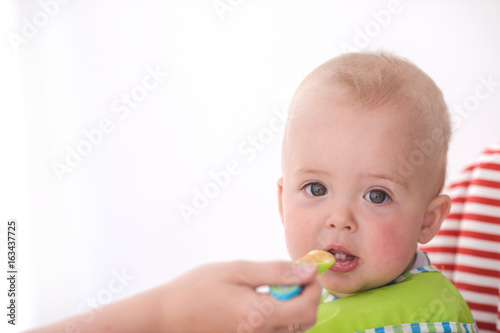 Parent feeding infant child
