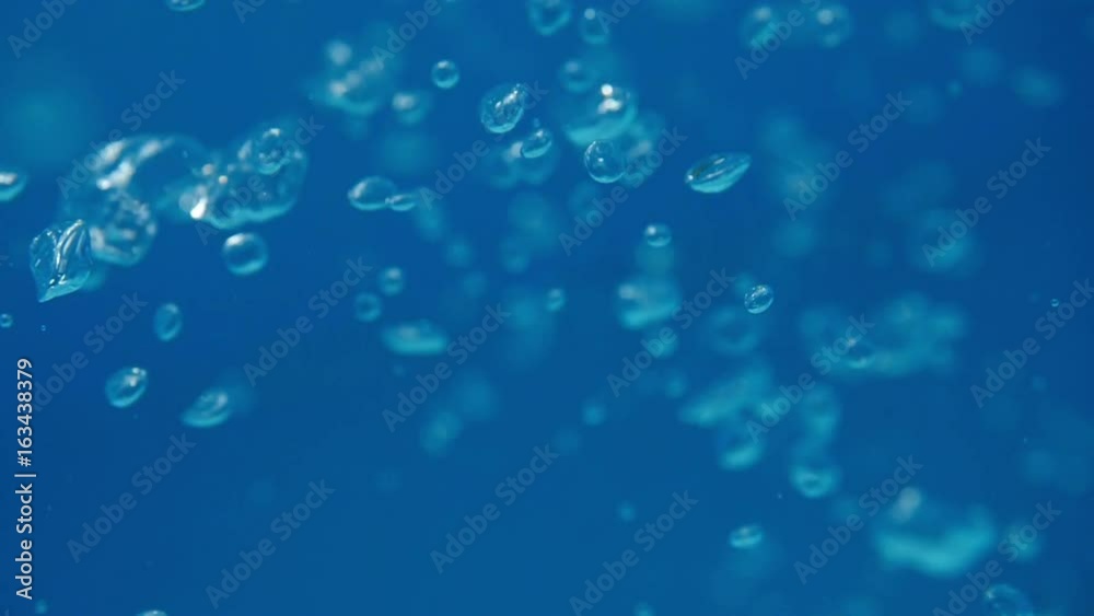 Bubbles rising to the surface. Air bubbles in water in sea (underwater shot), good for backgrounds. Slow motion.
Bubbles rising to the surface. Air bubbles in water in sea (underwater shot), good for backgrounds. Slow motion.