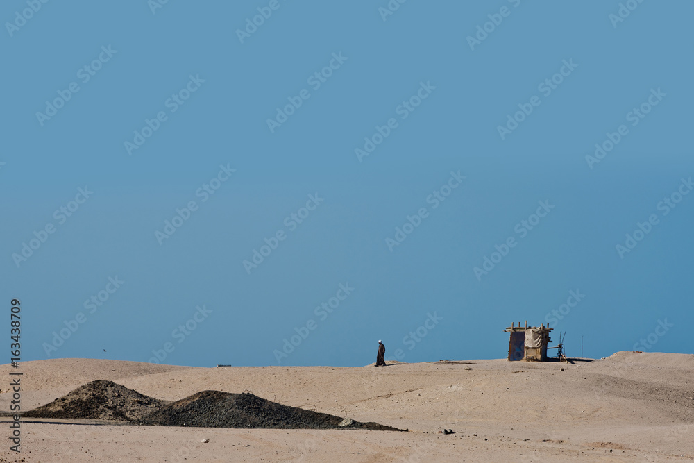 Sand dunes in desert with bedouin and nomad tent Sand dunes in desert with bedouin and nomad tent