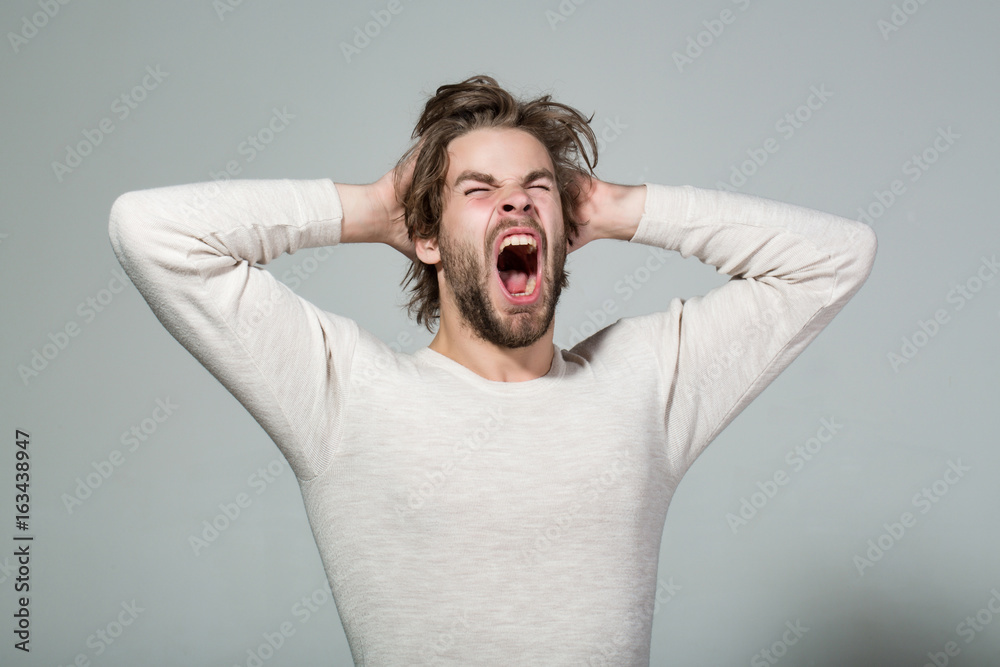 sleepy yawning man with long uncombed hair, morning wake up sleepy yawning man with long uncombed hair, morning wake up