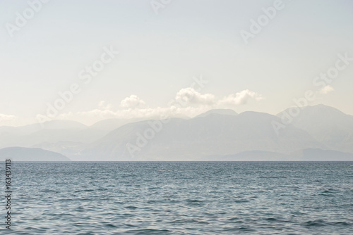 sea in the morning, mountain landscape background