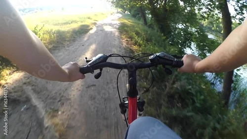 Extreme driving on the bike actoin camera go pro sunny day evening summer