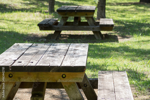 Fototapeta Naklejka Na Ścianę i Meble -  Empty picnic table in a tranquil park