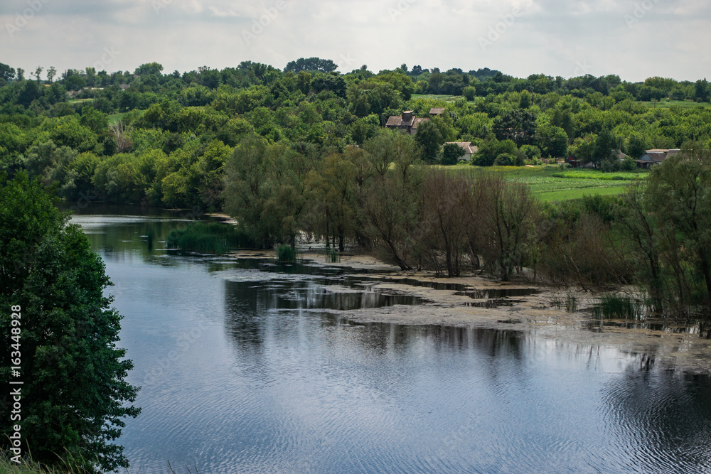 Summer sunny river landscape. Concept travel, travel. Summer sunny river landscape. Concept travel, travel.