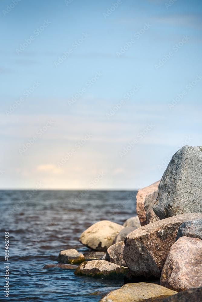 Seascape vertical. Large Stones and Sea