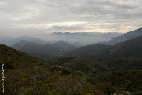 serra fina mountain range with clouds in the winter of minas gerais brazil horizontal