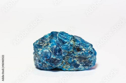 Precious stones 1 - Blue Apatite mineral gem on white (Macro Shot) photo