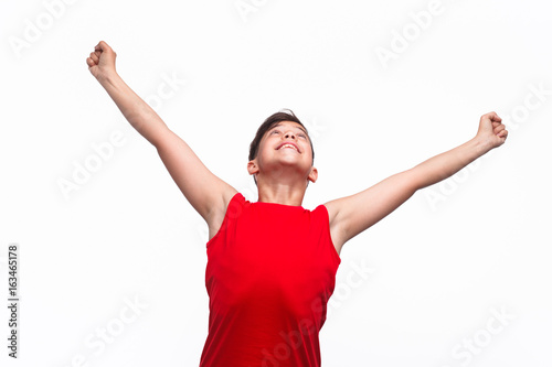Fotografie Happy kid with hands apart