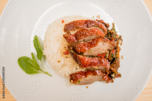 stir-fried roasted duck and basil and fried egg with rice, Thai food