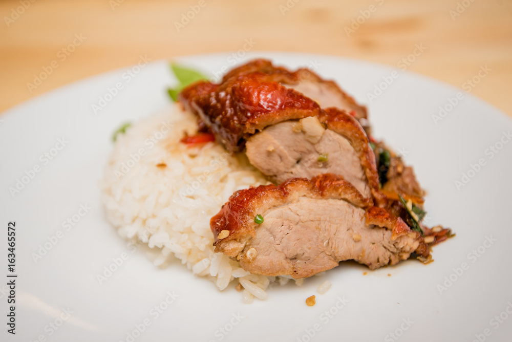 stir-fried roasted duck and basil and fried egg with rice, Thai food stir-fried roasted duck and basil and fried egg with rice, Thai food