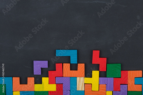 Business creative solution concept jigsaw on the blackboard