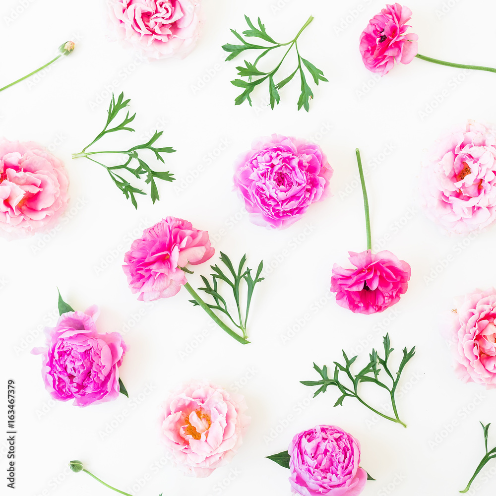 Floral composition of peonies, roses buds and leaves on white background. Flat lay, top view.