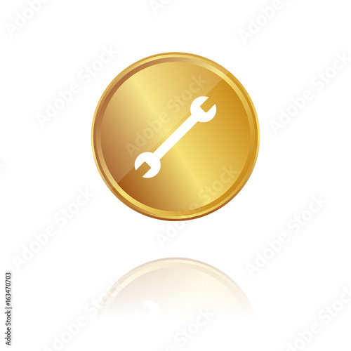 Schraubenschlüssel - Reparatur - Gold Münze mit Reflektion