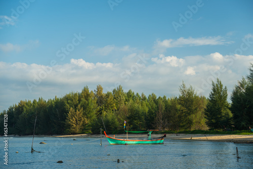 Fototapeta Naklejka Na Ścianę i Meble -  Fishing boats head out to sea
