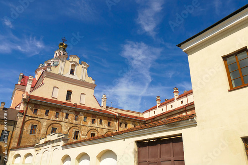 Baroque church on the background of the blue sky in the sun