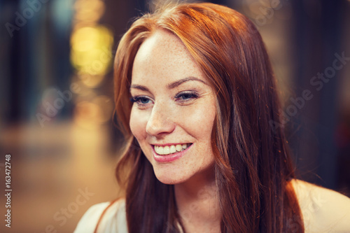 smiling happy young redhead woman face