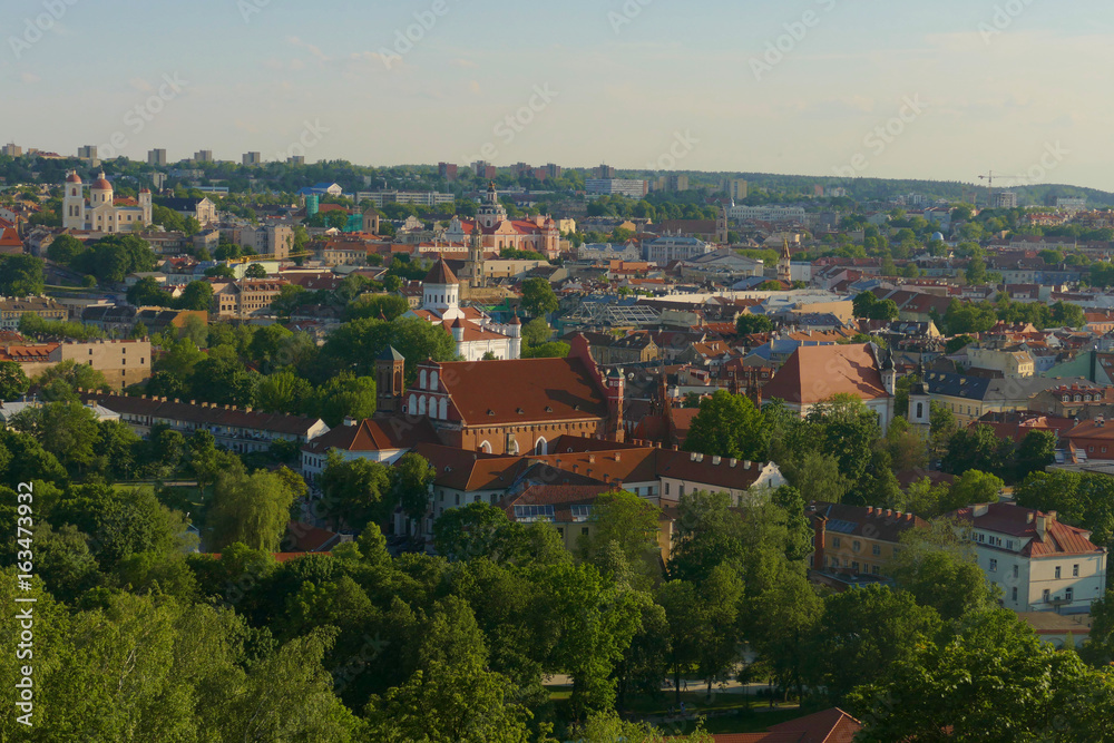 Panorama of the city of Vilnius with many monuments, churches, castles and greenery. City listed as a UNESCO World Heritage site.