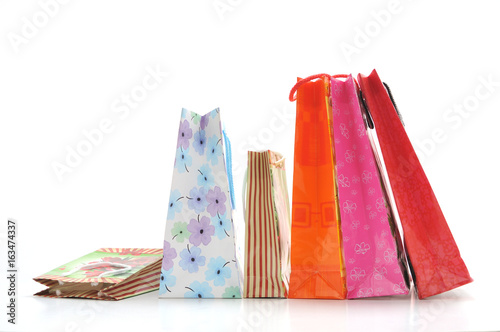 Colorful paper shopping bags isolated
