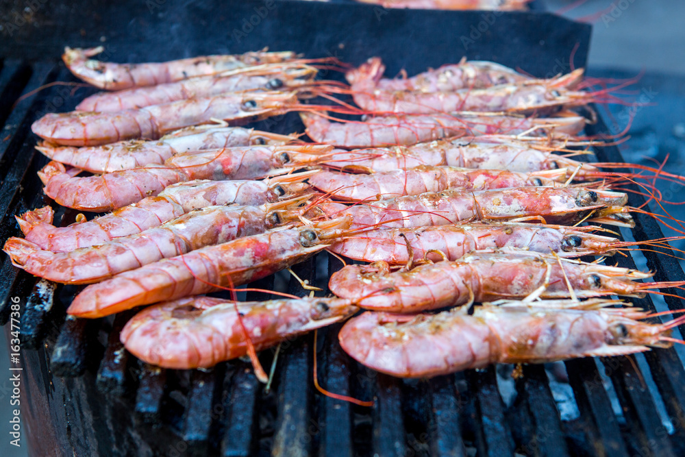 Shrimp on the grill. Large royal prawns on the grill