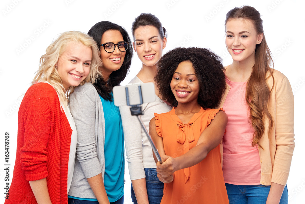 international group of happy women taking selfie international group of happy women taking selfie