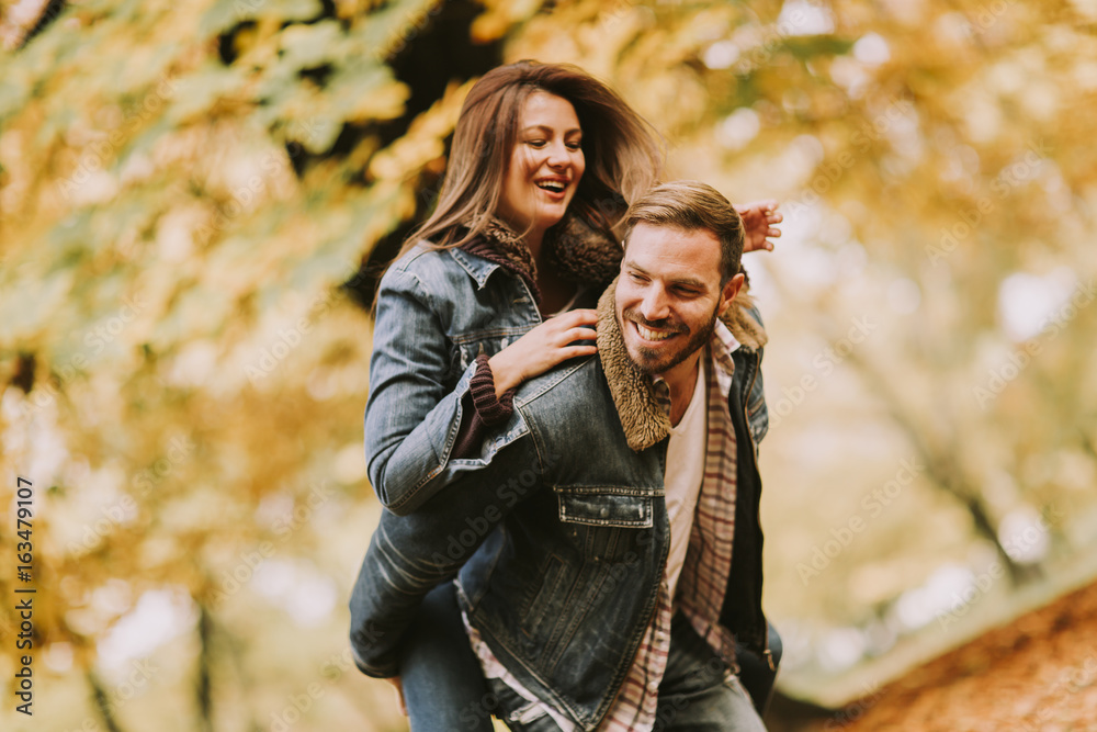 Loving couple in autumn park Loving couple in autumn park