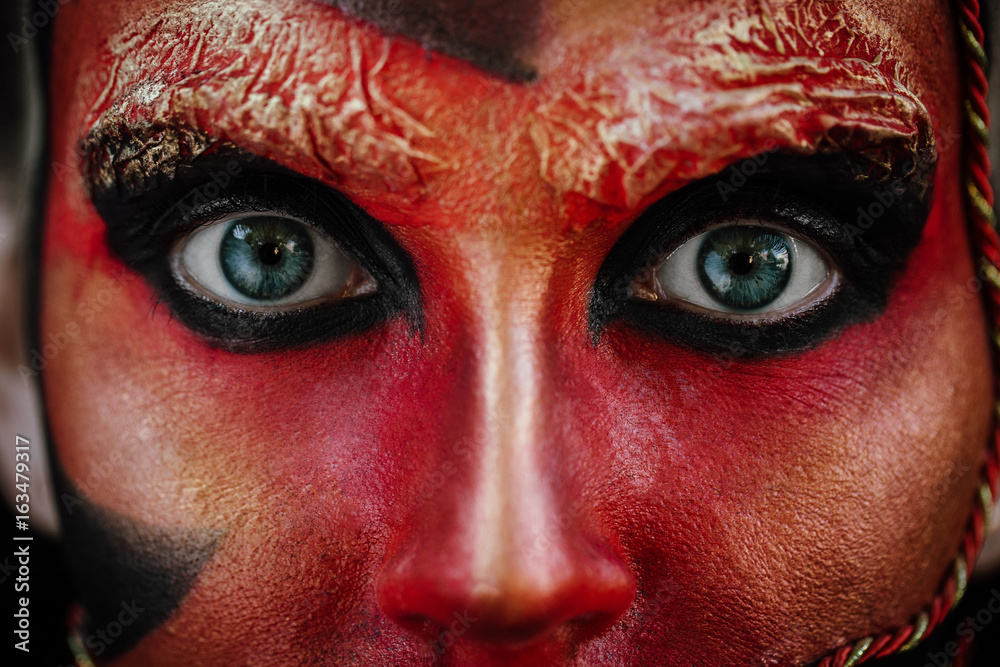 Close-up beauty red art make-up portrait of halloween woman Witch baroque. Close-up beauty red art make-up portrait of halloween woman Witch baroque.