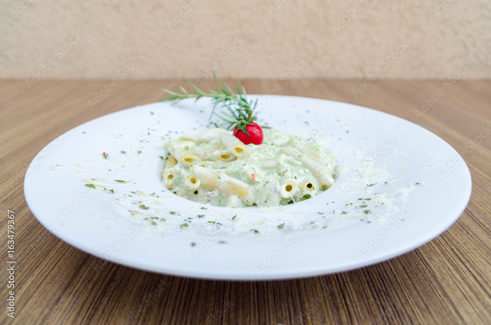 Italian penne with basil and chicken meat Italian penne with basil and chicken meat