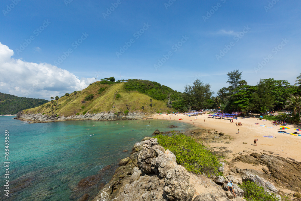 Beach Life. Tropical sea shore meeting a small Thai beach scene with sun beds and umbrellas. Beach Life. Tropical sea shore meeting a small Thai beach scene with sun beds and umbrellas.