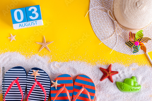 August 3rd. Image of august 3 calendar with summer beach accessories and traveler outfit on background. Summer day, Vacation concept