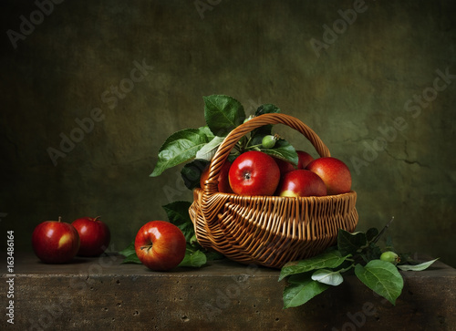 Still life with apples in a basket