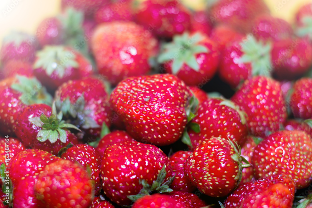 Fresh harvest of strawberries. Background of ripe fresh strawberries in full frame Fresh harvest of strawberries. Background of ripe fresh strawberries in full frame