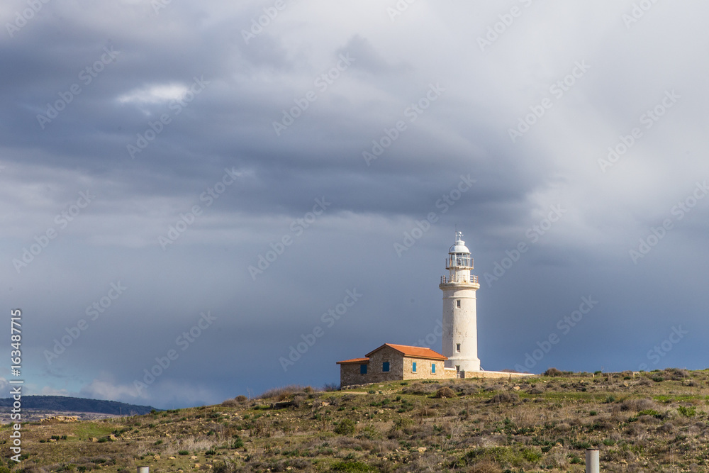 Lighthouse in Paphos, Cyprus, on the shores of the Mediterranean Sea Lighthouse in Paphos, Cyprus, on the shores of the Mediterranean Sea