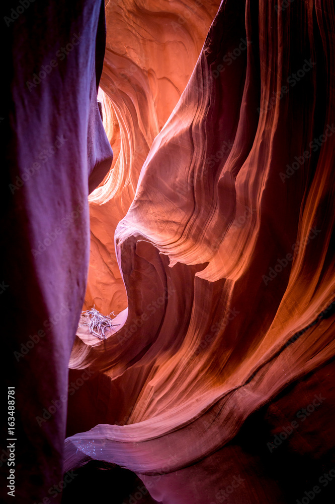 Play of light and shadow. Bizarre pattern of the walls of the lower Antelope Canyon