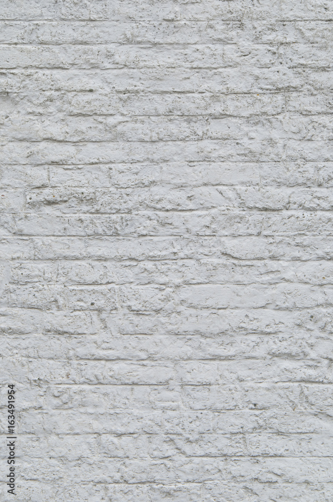 Wall of brick texture painted white Wall of brick texture painted white