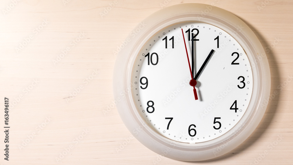 Clock ticking showing one hour Clock ticking showing one hour