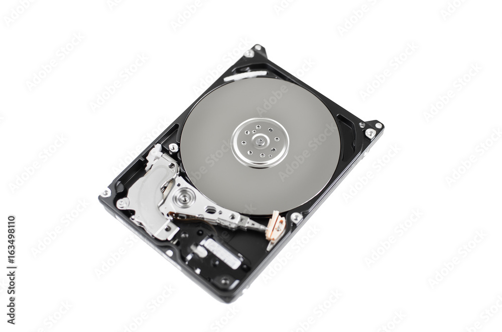 Inside of computer hard disk drive close up HDD isolated on white background Inside of computer hard disk drive close up HDD isolated on white background