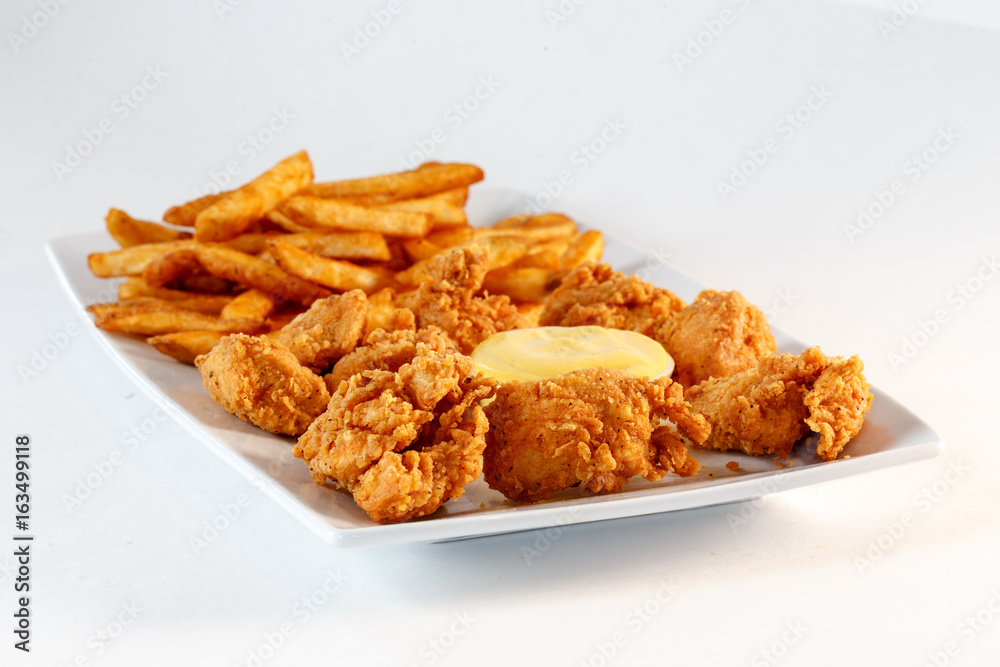 chicken fingers w/ fries and sauce chicken fingers w/ fries and sauce