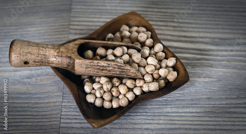 Hummus on a rustic wooden table