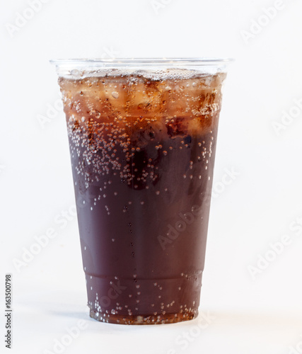 soda in clear plastic cup