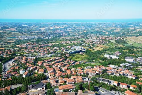 Fototapeta Naklejka Na Ścianę i Meble -  Panorama of Republic of San Marino and Italy from Monte Titano, City of San Marino. City of San Marino is capital city of Republic of San Marino located on Italian peninsula, near Adriatic Sea.